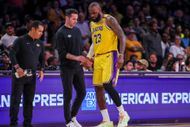 LeBron James limping during the game against Minnesota Timberwolves (Image via Getty)